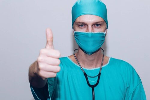 A Nurse posing thumbs up